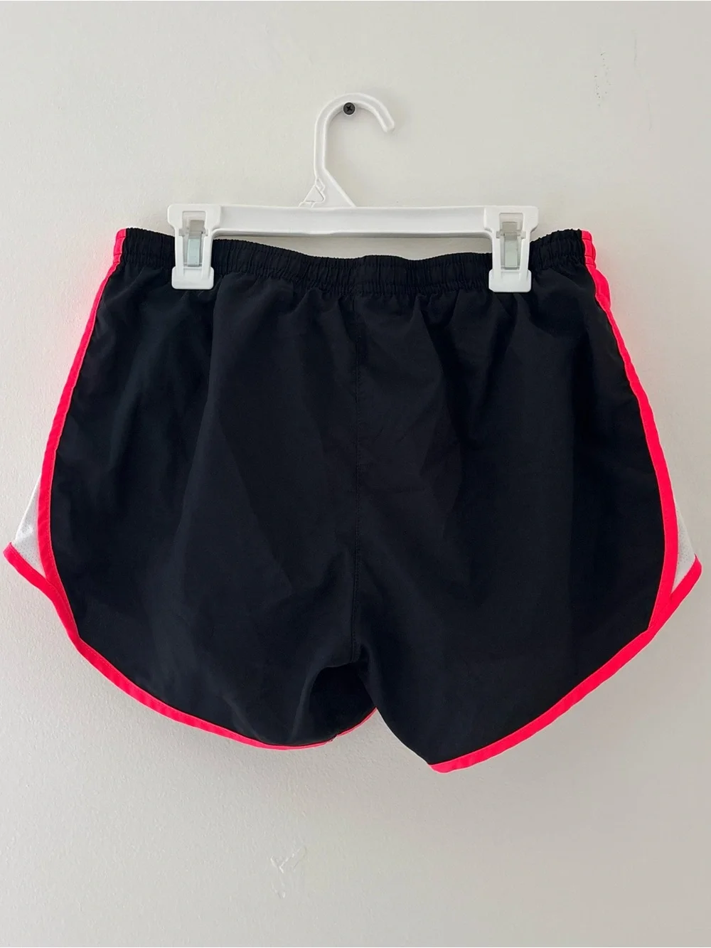 Nike Dri-Fit black shorts with pink/white side panels